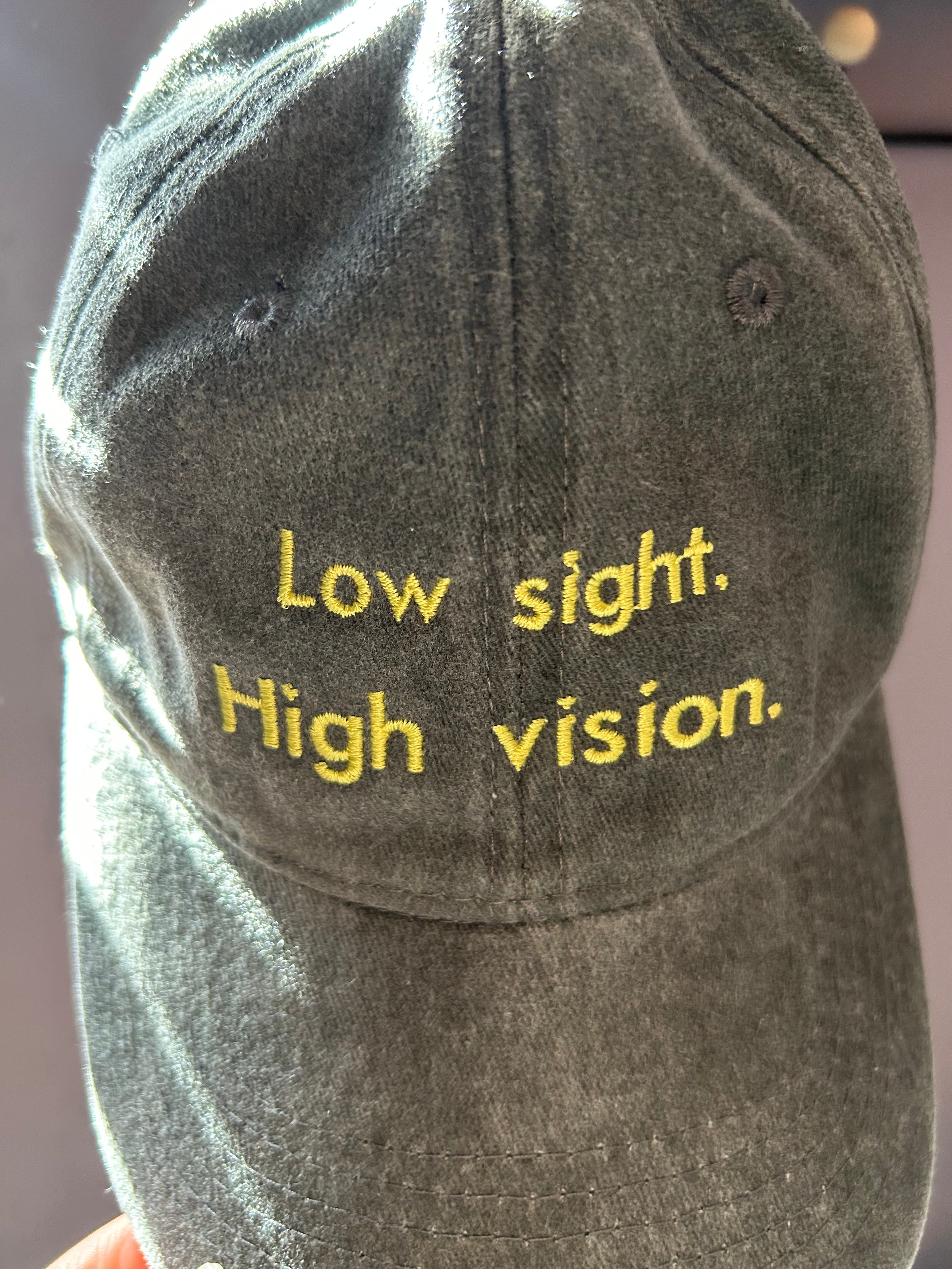 Low sight. High vision. Washed cotton cap in black and yellow.