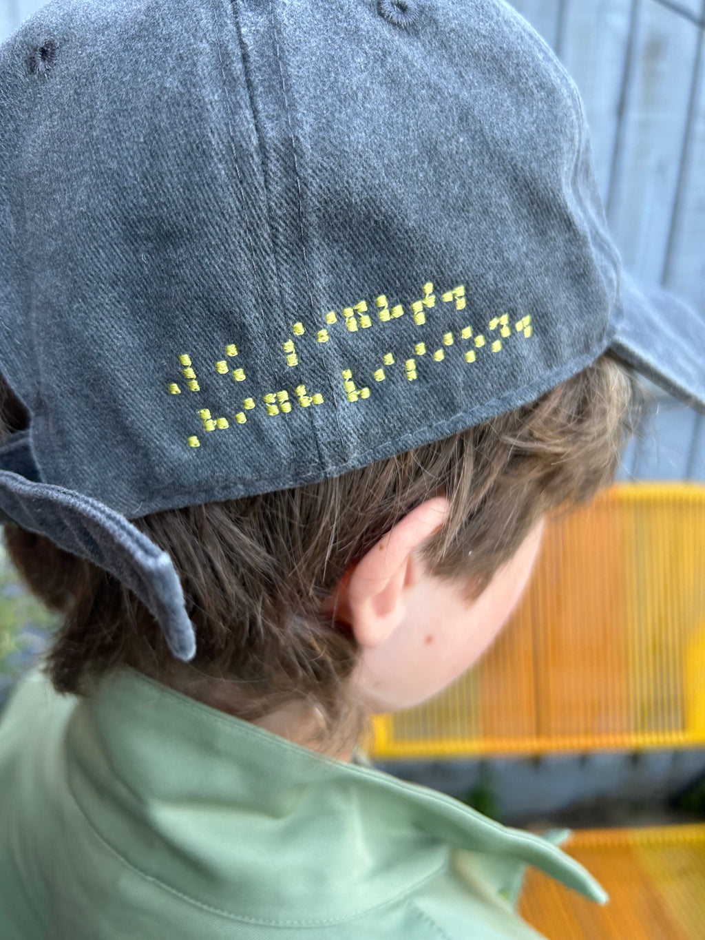 Low sight. High vision. Washed cotton cap in black and yellow.