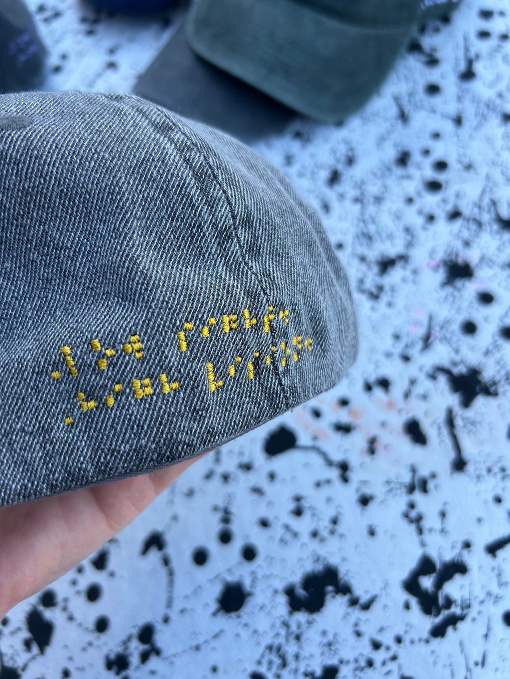 Low sight. High vision. Acid denim 100% cotton cap with yellow embroidery.