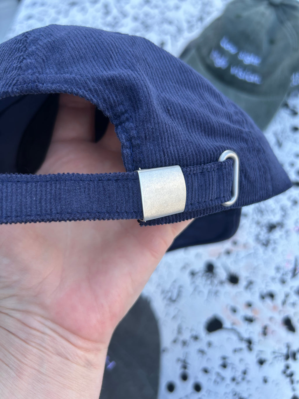 Low sight. High vision.  Navy cord 100% cotton cap with white embroidery