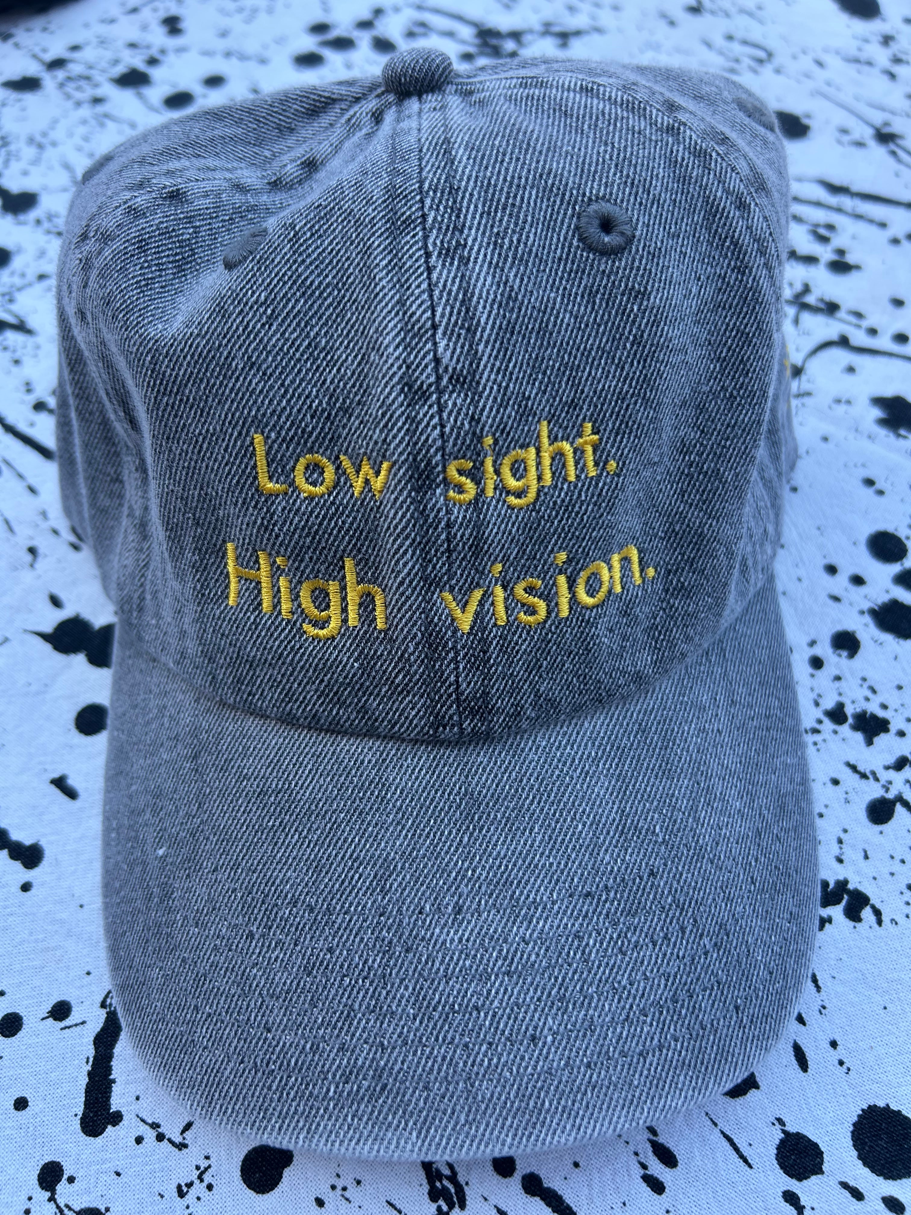 Low sight. High vision. Acid denim 100% cotton cap with yellow embroidery.