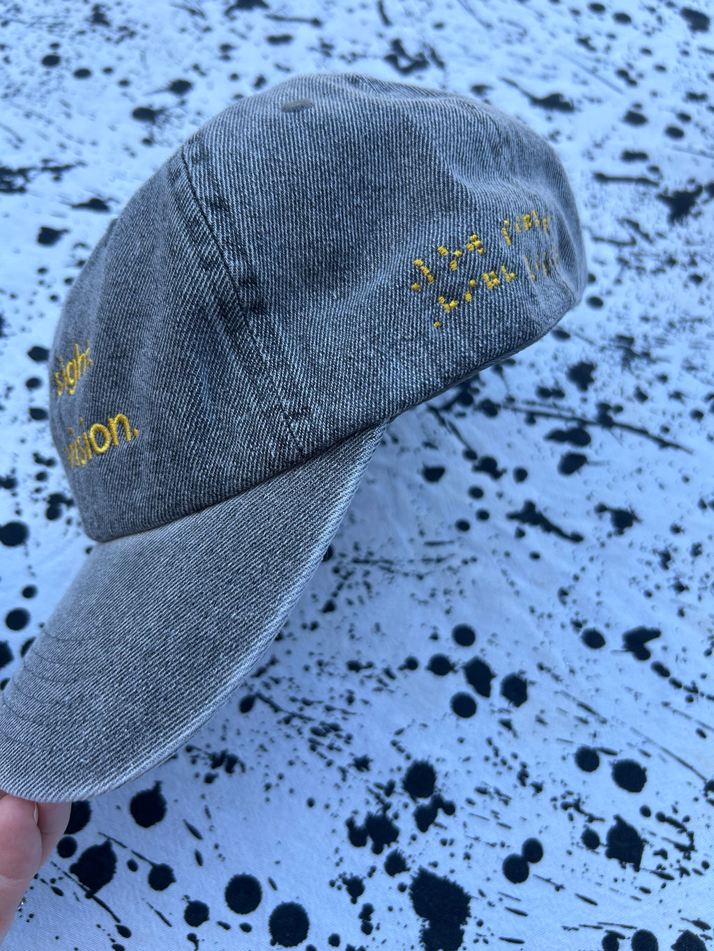 Low sight. High vision. Acid denim 100% cotton cap with yellow embroidery.
