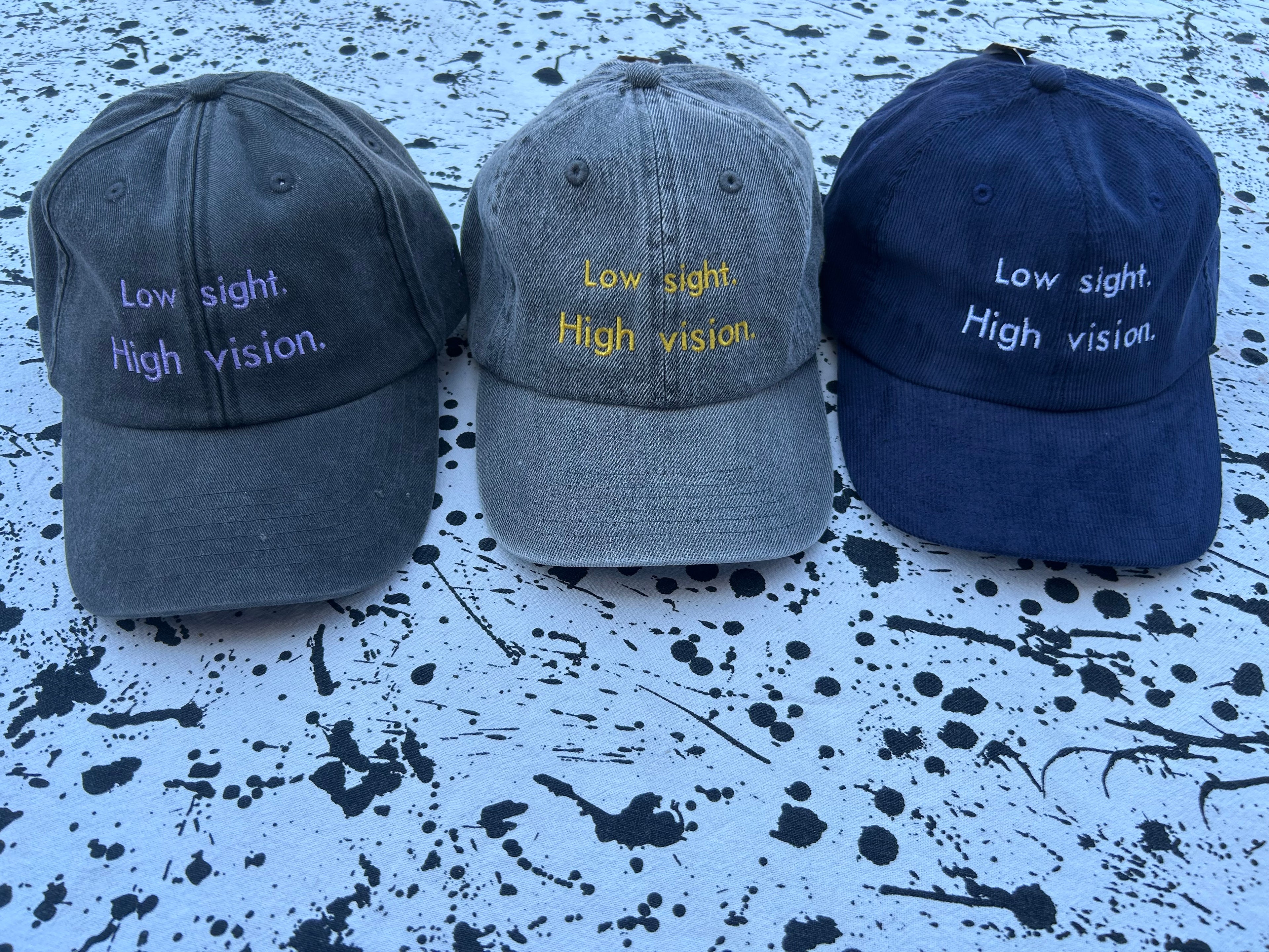 Low sight. High vision. Acid denim 100% cotton cap with yellow embroidery.