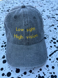 Low sight. High vision. Acid denim 100% cotton cap with yellow embroidery.