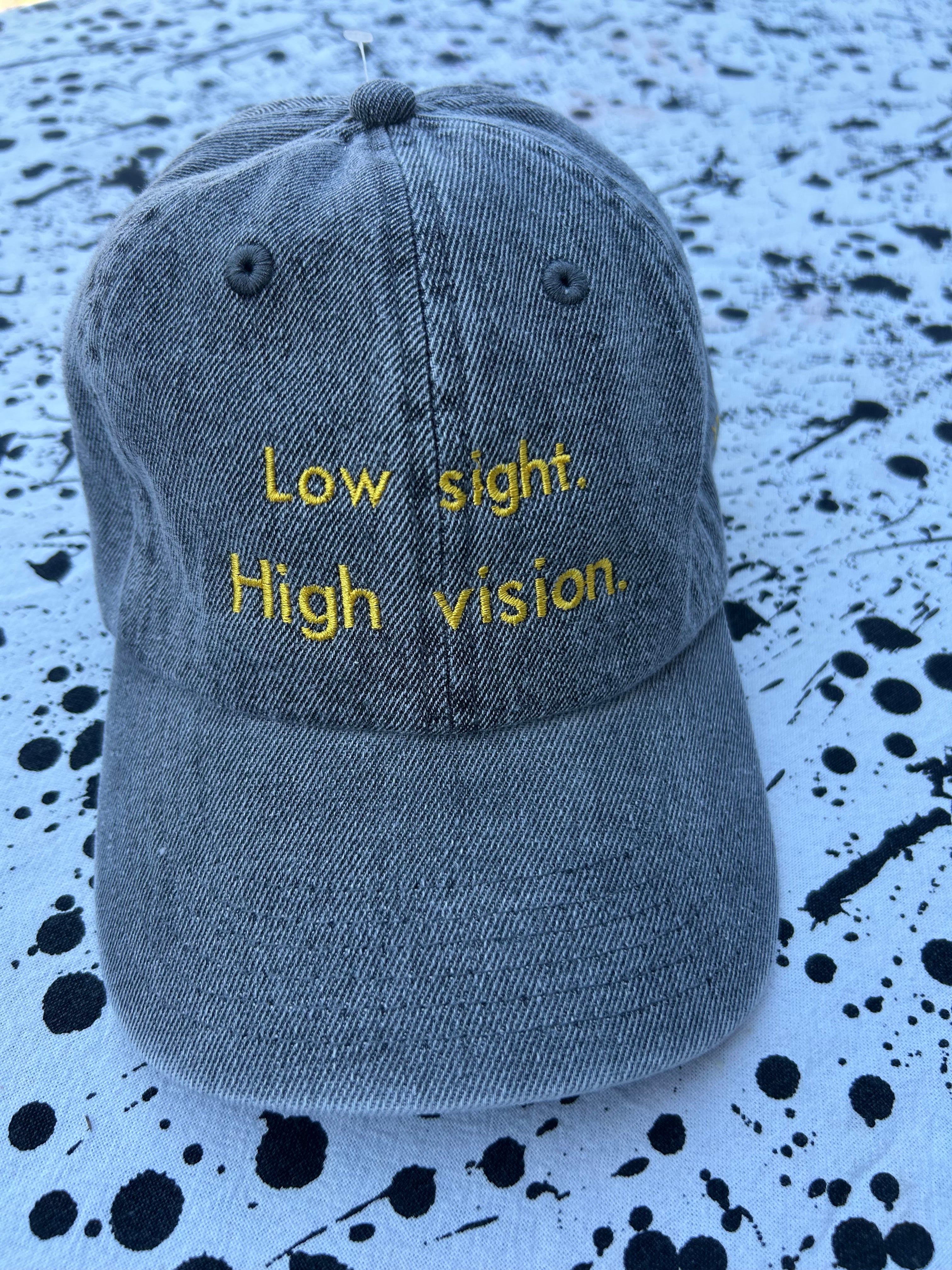 Low sight. High vision. Acid denim 100% cotton cap with yellow embroidery.